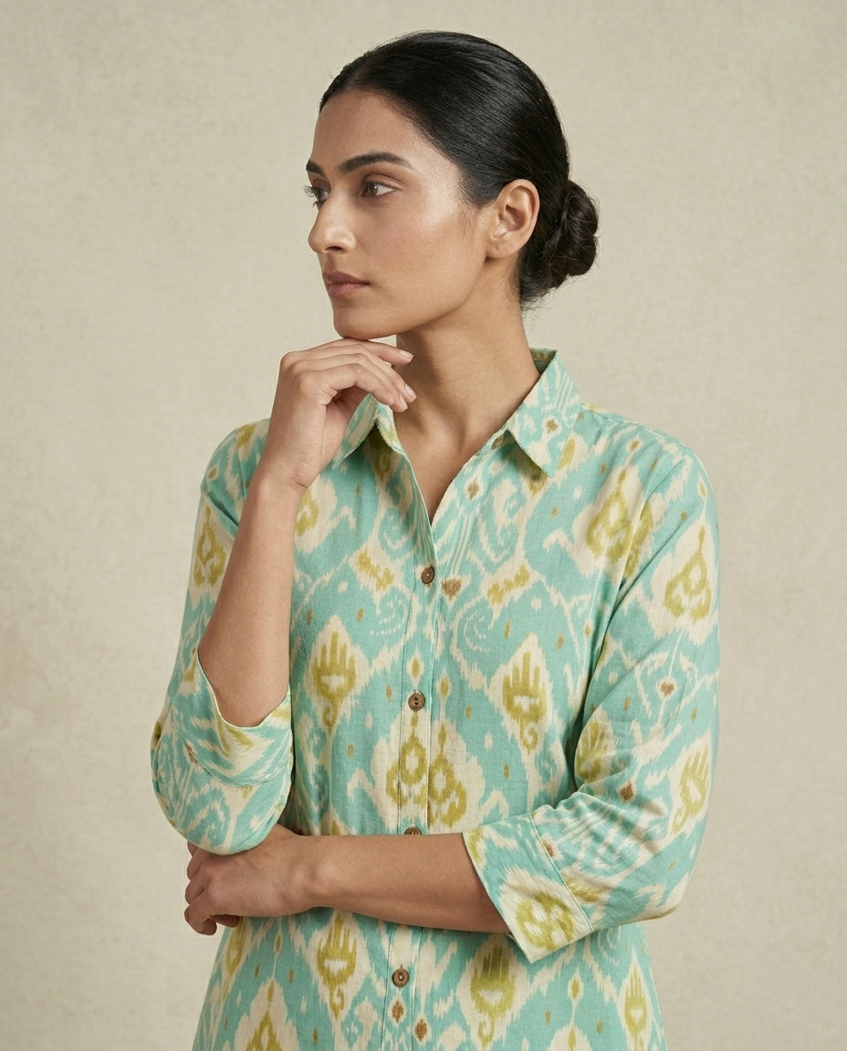 Ikat-inspired geometric motif in a refreshing palette of seafoam green,